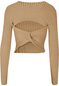 Top scurt bej cu mânici lungi, având un detaliu frontal răsucit și un design cu spatele deschis. Material moale, elastic și cu un finisaj texturat.