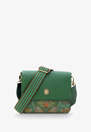 Green crossbody bag with a flat flap, floral and patterned detailing, a striped strap, and a circular gold hardware accent.