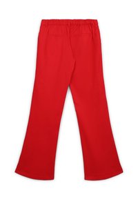 Pantaloni larghi rossi con vita elasticizzata, dotati di due tasche posteriori e una trama di tessuto liscia.