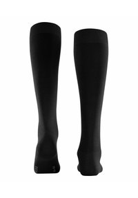 Calze nere alte fino al ginocchio con bordo a coste, texture liscia e tallone rinforzato. Presentano un design senza cuciture e senza motivi o accenti visibili.