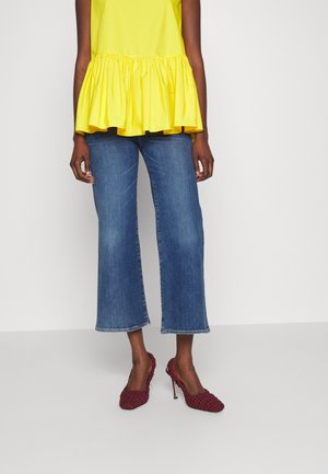 THE CROPPED ILLUSION STRIDE - Bootcut jeans - light blue