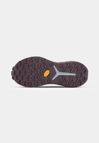 Purple rubber sole with textured tread patterns, featuring a central light gray accent and a yellow logo. Sturdy design for traction.