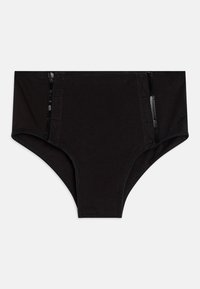 Culottes en coton noir avec une coupe taille haute, ornées de finitions élastiques et de détails subtils sur les panneaux latéraux pour un confort accru. Texture lisse.