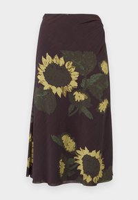 Μίντι φούστα σκούρου μοβ χρώματος με μεγάλο μοτίβο εκτύπωσης κίτρινων ηλιοτροπίων και πράσινων φύλλων.