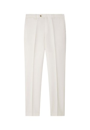Pantalon sur mesure pour homme blanc cassé avec passants pour ceinture, poches latérales, bouton à l’avant et pli frontal sur chaque jambe.