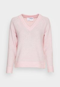 Lyserød v-hals trøje lavet af blødt, struktureret stof. Har lange ærmer og ribstrikkede manchetter samt kant for en afslappet pasform.