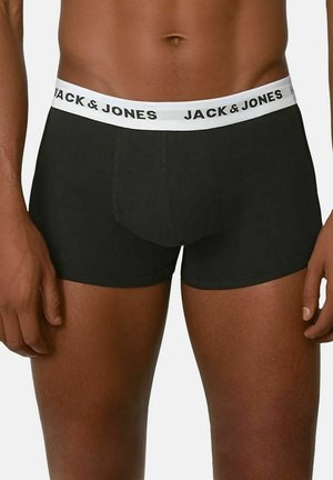 Schwarze Boxershorts aus weichem Stoff. Verfügt über einen weißen elastischen Bund mit dem wiederholten Schriftzug "JACK & JONES" und bietet eine enge Passform.
