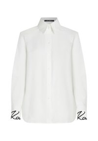 White long-sleeve shirt with a button-down collar, featuring a relaxed fit and black embroidered accent on the cuffs. Smooth texture.