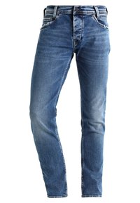 Blå denimjeans med slim fit, med femficksdesign, subtila slitningar och ljus blekning. Metalldragkedja och knappstängning.
