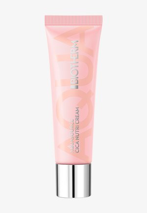 Pink tube of Aquasource Cica Nutri Cream with silver cap. Features bold white lettering on front, smooth texture, and tapered design.