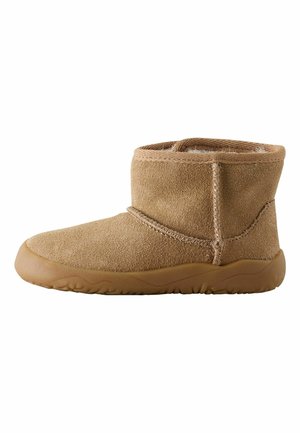Brauner Wildleder-Stiefel mit weichem Futter und Gummisohle, für Wärme und lässiges Tragen konzipiert.