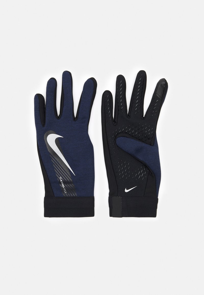 Gants de performance bleu marine avec accents noirs, prise texturée sur la paume, logo réfléchissant et poignet ajusté pour un maintien sécurisé.