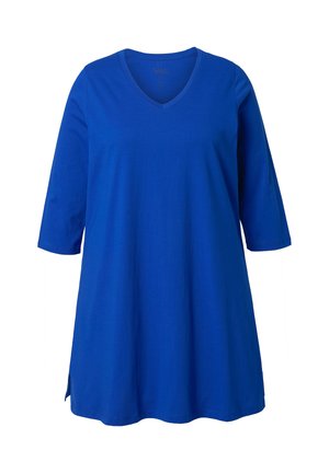 Tunika in cotone blu con scollo a V, maniche a tre quarti, spacco ai lati dell'orlo e vestibilità rilassata. Texture liscia e design semplice.