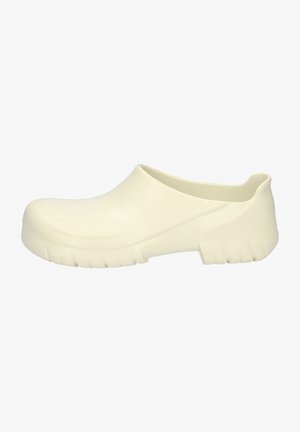 White rubber clogs featuring a smooth, rounded design, slip-on style, and textured grip outsole with pronounced treads.