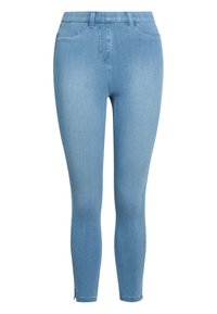 Light blue denim skinny jeans with a smooth texture, featuring a mid-rise waist and ankle zippers for adjustable fit. Classic five-pocket design.