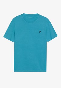 Turquoise cotton t-shirt with a crew neck and short sleeves. Features a small black bird logo on the left chest. Smooth texture.