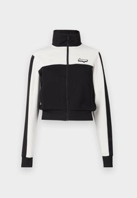 Veste zippée raccourcie avec un corps noir et un panneau supérieur et des manches blanches ; poignets côtelés ; détail logo sur la poitrine.