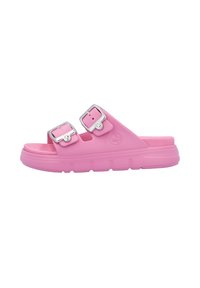 Pink molded slide sandal with two adjustable silver buckle straps and textured footbed. Features a durable rubber sole with ridges.