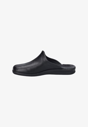 Černá kožená nazouvací bota s hladkým povrchem, zaoblenou špičkou a nízkoprofilovou gumovou podrážkou. Má minimalistický design a žádné viditelné zapínání.