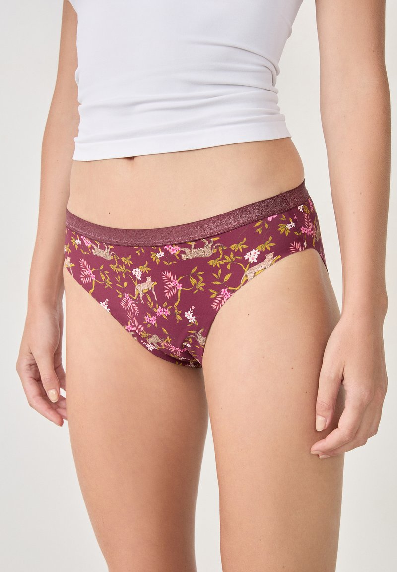 Mutande bordeaux con motivo floreale in rosa e oro, caratterizzate da una fascia elastica brillante e tessuto di cotone.