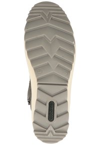 Grau gummierte Schuhsohle mit einem Zickzackprofil. Mit beigen Kanten und geprägt mit Branding, Größe 38 ist auf der Sohle sichtbar.