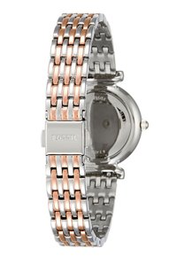 Montre en acier inoxydable argenté et rose doré avec un bracelet à maillons, un boîtier rond et un fermoir gravé avec "FOSSIL."