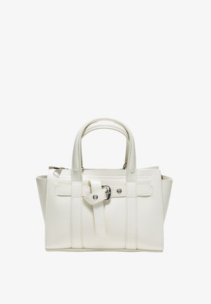 Petit sac à main en cuir blanc avec deux poignées, panneaux latéraux et une lanière décorative avant avec boucle et œillets métalliques.