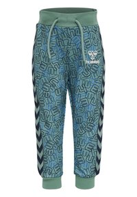 Gröna joggingbyxor med ett abstrakt blått mönster, elastisk midja med dragsko, marinblå sidosträck med chevrondetaljer och logotypdetalj.