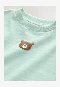 Niet geselecteerd, mineral blue bear