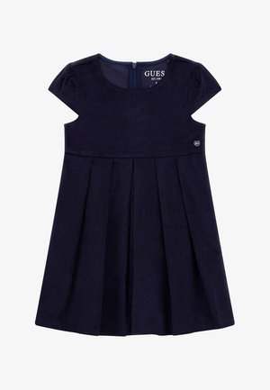 Robe bleu marine à manches courtes pour tout-petit avec jupe plissée, encolure ronde, fermeture éclair au dos et petit ornement en forme de cœur métallique à la taille.