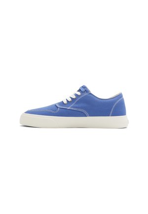 Blue canvas sneakers with white laces, a rounded toe, and white rubber sole. Features visible stitching along the edges and a smooth texture.
