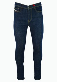 Jean skinny en denim bleu foncé avec des coutures jaunes. Comprend un cordon de serrage rouge, cinq poches et une coupe slim.