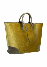 Borsa tote in velluto verde con motivo floreale a rilievo; dettagli e manici in pelle grigia; forma strutturata con fondo rinforzato.