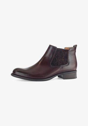 Stivale Chelsea in pelle marrone con pannello in tessuto testurizzato, punta arrotondata, tacco basso e inserzioni elastiche sui lati per una facile calzata.