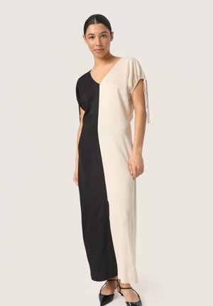 Schwarzes und beige farblich abgesetztes Kleid mit V-Ausschnitt, kurzen Ärmeln und Bindedetails, aus weichem, leichtem Stoff gefertigt.