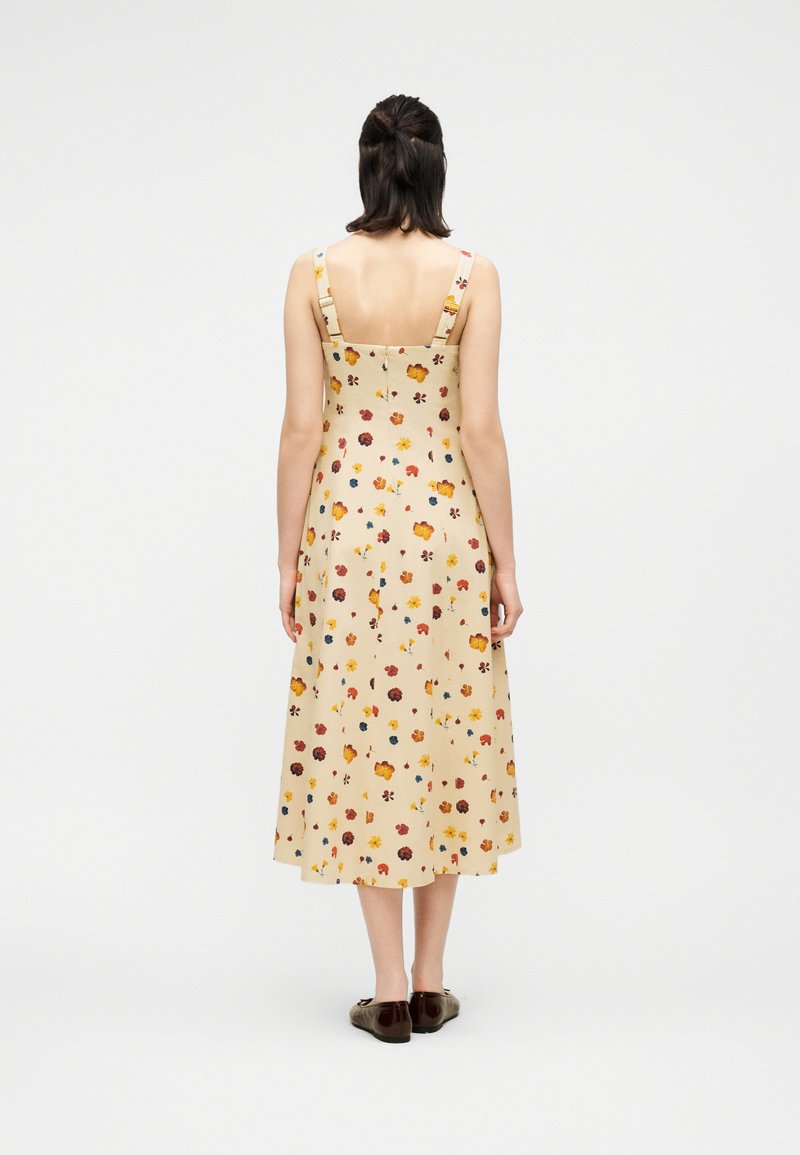tiered midi dress casual Sunny Spritzer Tiered Midi Dress in Navy