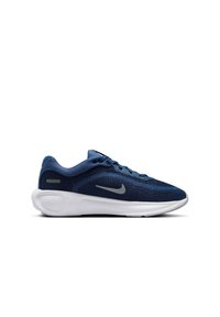 Temno modra Nike tekaška obutev z mrežnim zgornjim delom, sivo sivim logotipom in debelim bež blaženim podplatom, prikazana v stranskem profilu.