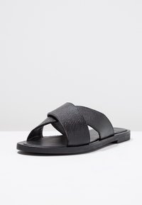 KIOMI Platt slip-in - black