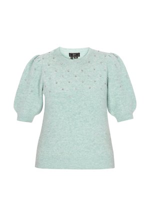 Suéter verde menta con mangas abullonadas, tela texturizada y adornado con pequeñas tachuelas plateadas en el pecho y los hombros. Cuello redondo clásico.