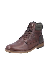 Bottes chevilles en cuir marron avec un col en tissu vert texturé, bout arrondi, design à lacets et semelle en caoutchouc contrastante.