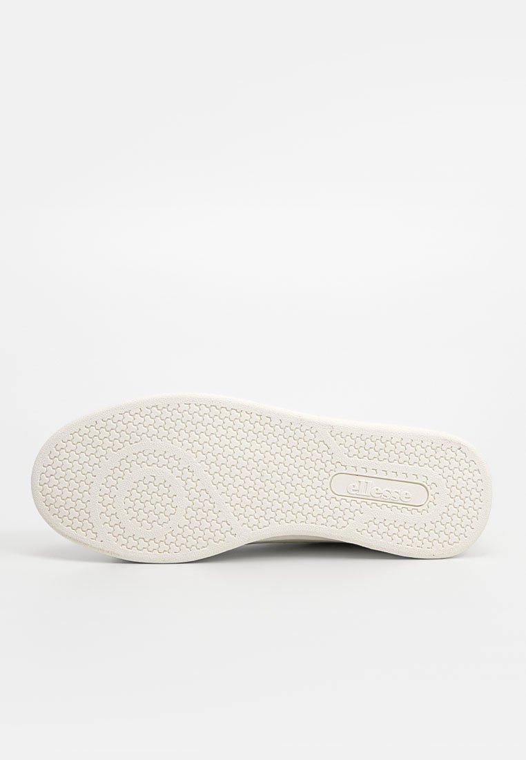 Semelle de chaussure en caoutchouc blanc avec un motif hexagonal, un design circulaire près de l'orteil, et le logo "ellesse" embossé près du talon.