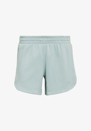 Light green athletic shorts with a textured fabric, elastic waistband, and side slits for mobility. Features a subtle logo detail.