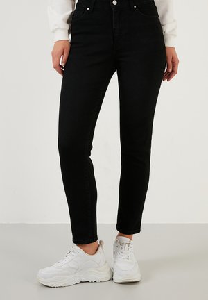 SLIM FIT - Slim fit jeans - black