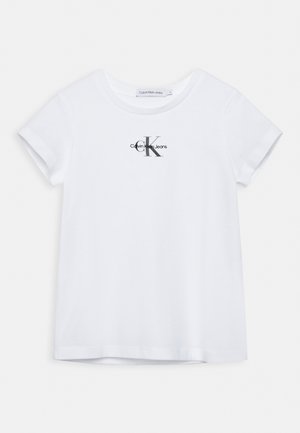 Biely bavlnený tričko s okrúhlym výstrihom a krátkymi rukávmi. Zobrazuje čierne logo "Calvin Klein Jeans" so zjednodušeným písmenom "K."