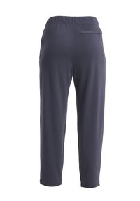 Pantalons gris foncé à enfiler, avec une texture lisse et une taille élastique. Comprend une seule poche arrière et des jambes fuselées.