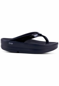 Black flip-flop sandals with a textured footbed, shiny straps, and a thick sole for cushioning, designed for comfort and durability.