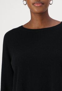 Repeat - Sweter