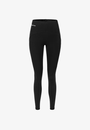 Čierne legíny vyrobené z elastického materiálu, s vysokým pásom, bezšvovým dizajnom a diskrétnym logom na prednej strane.