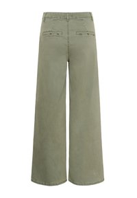 Pantalon large couleur vert olive clair, taille haute avec deux poches horizontales à l'arrière, vu de dos.