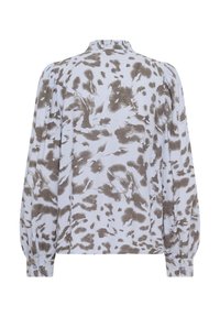 Blusa a maniche lunghe di colore azzurro chiaro con stampa astratta marrone, con scollatura arricciata e polsini con bottoni. Tessuto morbido e lavorato.